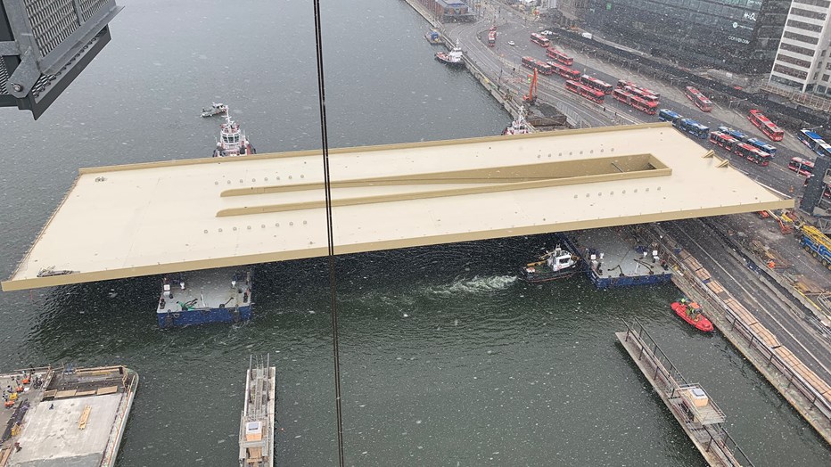 The bridge is towed and pulled closer to its final destination. The bridge is towed and pulled closer to its final destination.
