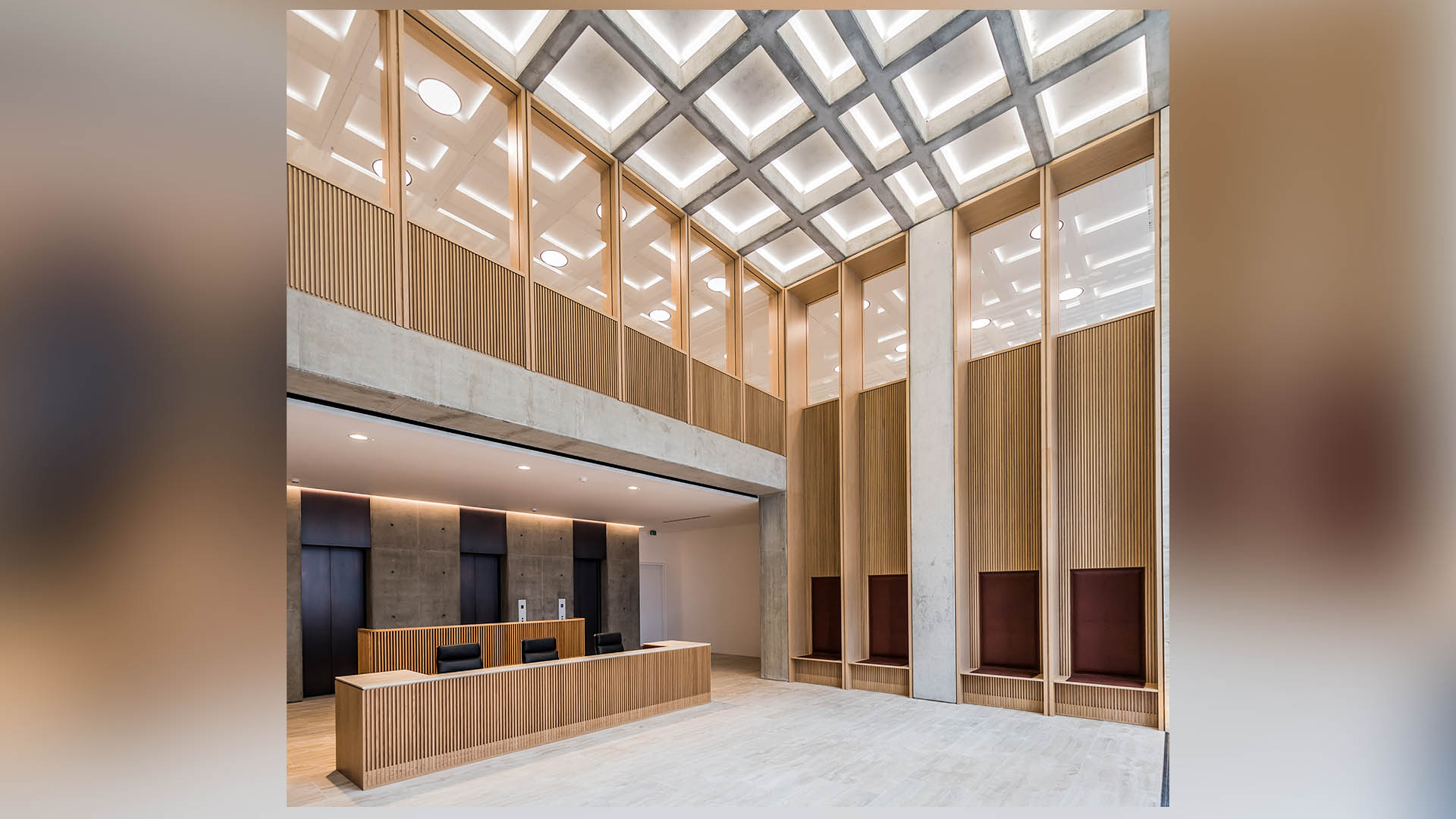 The reception area has Travertine Stone flooring and oak cladding.